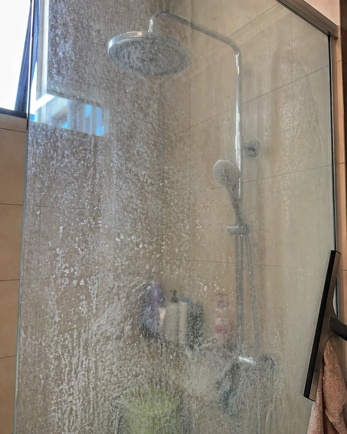 Untreated glass — heavy water marks and limescale buildup