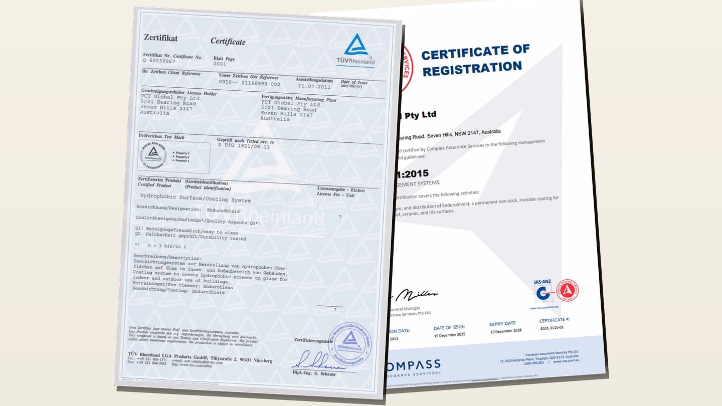 Two third-party certificates verifying EnduroShield: TÜV Rheinland Certificate Q60039967 for the hydrophobic coating and ISO 9001:2015 quality management for PCT Global, the Brisbane manufacturer